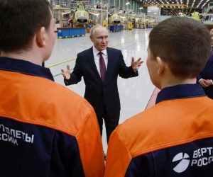 epa10522551 Russian President Vladimir Putin meets with staff members during his visit to the Ulan-Ude Aviation Plant, part of the Rostec's Russian Helicopters manufacturing company, in Ulan-Ude, the Republic of Buryatia, Russia, 14 March 2023. Putin is on a working trip to Buryatia, where he visited the Ulan-Ude Aviation Plant, one of Russia's leading helicopter manufacturers.  EPA/VLADIMIR GERDO /SPUTNIK/KREMLIN / POOL MANDATORY CREDIT