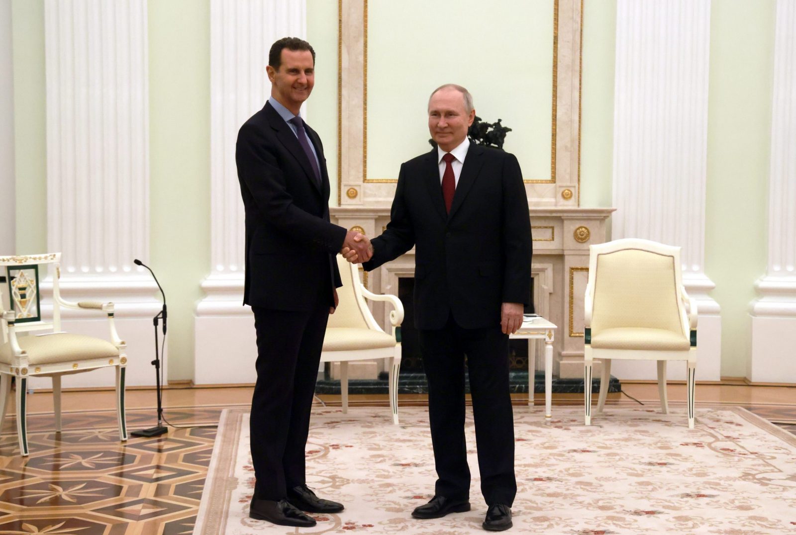 epa10524427 Russian President Vladimir Putin (R) shakes hands with Syrian President Bashar al-Assad during their meeting at the Kremlin in Moscow, Russia, 15 March 2023. The authorities of Russia and Syria are in constant contact, thanks to the Russian military in this country, significant progress has been made in the fight against terrorism, says Putin. Al-Assad expressed support for the Russian special military operation in Ukraine.  EPA/VLADIMIR GERDO/SPUTNIK/KREMLIN/ POOL MANDATORY CREDIT