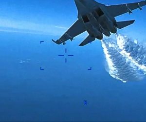 epa10525960 A still images taken from a handout video made available by the US Central Command (CENTCOM) Public Affairs via the Defense Visual Information Distribution Service (DVIDS) shows a Russian Su-27 aircraft moments before droppeed fuel hits an US unmanned MQ-9 aircraft operating over the Black Sea on 14 March 2023 (issued 16 March 2024). Russian Su-27s dumped fuel upon and struck the propeller of the MQ-9, causing U.S. forces to have to bring the MQ-9 down in international waters.  EPA/US Air Force video / HANDOUT  HANDOUT EDITORIAL USE ONLY/NO SALES