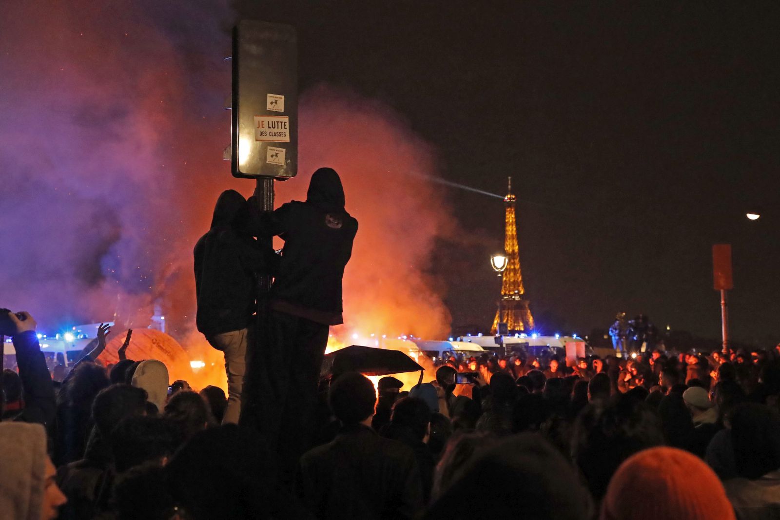 epa10528917 Protesters set fire to construction equipments at Concorde square as people gather near the National Assembly to protest against the pension reform law in Paris, France, 17 March 2023. A second day of protest is expected around the National Assembly after French Prime Minister Elisabeth Borne on 16 March had announced the use of article 49 paragraph 3 (49.3) of the Constitution of France to have the text on the controversial pension reform law to be definitively adopted without a vote.  EPA/TERESA SUAREZ