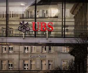 epa10530045 Logos of the Swiss banks 'Credit Suisse' and 'UBS' are seen on different buildings in Zurich, Switzerland, 18 March 2023.  EPA/MICHAEL BUHOLZER