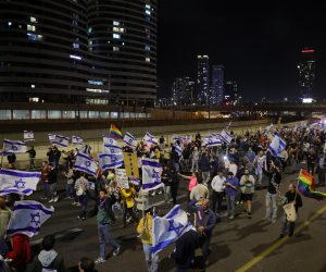 epa10530880 Protesters block the Ayalon main highway during a protest march against the government's justice system reform plans in Tel Aviv, Israel, 18 March 2023. Nationwide protests against the government's judicial reform plans are being held for eleven weeks in a row. Israel's parliament passed a draft law limiting the power of the Israeli Supreme Court in a first reading on 14 March.  EPA/ABIR SULTAN