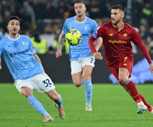 epa10532497 SS Lazio's Danilo Cataldi (L) vies for the ball with AS Roma's Lorenzo Pellegrini (R) during the Italian Serie A soccer match between SS Lazio and AS Roma, in Rome, Italy, 19 March 2023.  EPA/ETTORE FERRARI