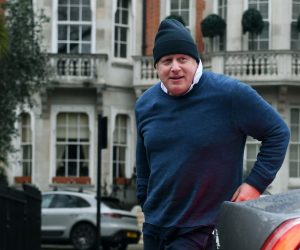 epa10534493 Former British Prime Minister Boris Johnson outside his home in London, Britain, 21 March 2023. Johnson is set to give evidence to MPs who are investigating accusations that he misled Parliament over Partygate, on 22 March.  EPA/ANDY RAIN