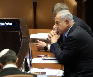 epa10536862 Israeli Prime Minister Benjamin Netanyahu attends a voting session on judicial reform bill at the Knesset Plenum, in Jerusalem, Israel, 22 March 2023. Nationwide protests against the government's judicial reform plans are being held for 12 weeks in a row. Israel's parliament passed a draft law limiting the power of the Israeli Supreme Court in a first reading on 14 March.  EPA/ABIR SULTAN
