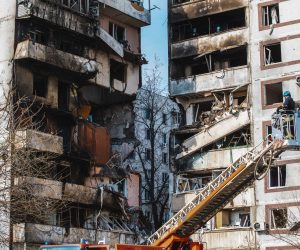 epa10537538 Rescuers work at a residential building after it was hit in a missile strike in Zaporizhzhia, Ukraine, 22 March 2023. At least 34 persons were injured, of which one died later in the hospital, according to the State Emergency Service. Russian troops on 24 February 2022 entered Ukrainian territory, starting a conflict that has provoked destruction and a humanitarian crisis.  EPA/ARSEN DZODZAIEV