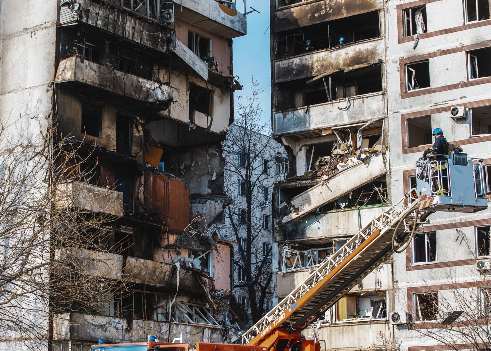 epa10537538 Rescuers work at a residential building after it was hit in a missile strike in Zaporizhzhia, Ukraine, 22 March 2023. At least 34 persons were injured, of which one died later in the hospital, according to the State Emergency Service. Russian troops on 24 February 2022 entered Ukrainian territory, starting a conflict that has provoked destruction and a humanitarian crisis.  EPA/ARSEN DZODZAIEV
