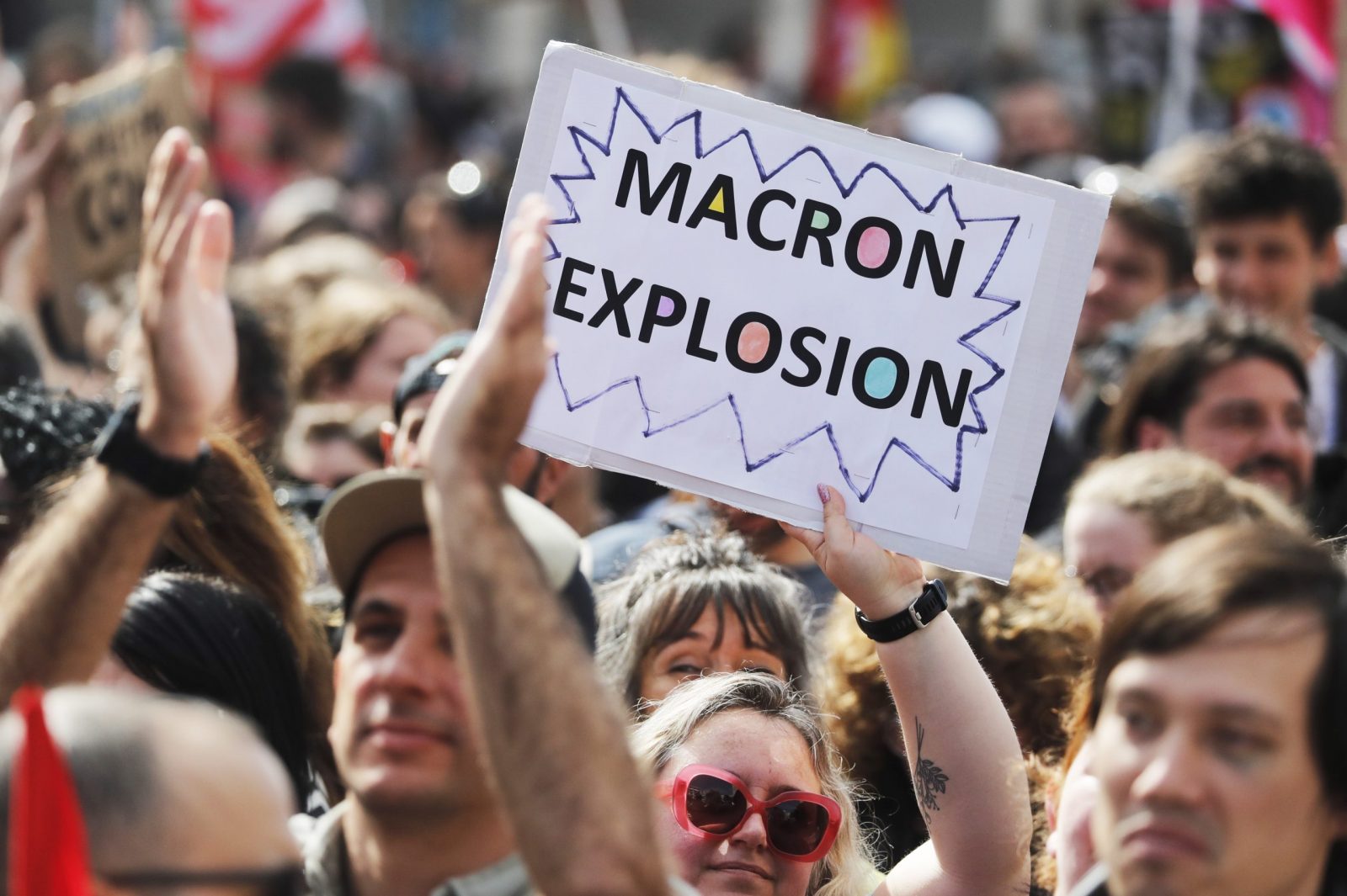 epa10538526 People attend a rally against the government's reform to the pension system, in Marseille, France, 23 March 2023. Protests continue in France after the prime minister announced on 16 March 2023 the use of Article 49 paragraph 3 (49.3) of the French Constitution to have the text on the controversial pension reform law - raising retirement age from 62 to 64 - be definitively adopted without a vote.  EPA/GUILLAUME HORCAJUELO