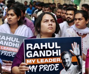 epa10538622 Members of the National Students Union of India (NSUI) rally against Bharatiya Janata Party lead Indian Prime Minister Narendra Modi during a protest in support Congress Senior Leader Rahul Gandhi, in Bangalore, India 23 March 2023. Congress leader Rahul Gandhi was found guilty and sentenced for two years in prison on Thursday in a 2019 criminal defamation case over his remarks about Prime Minister Narendra Modi's surname by a Gujarat court in Surat. However, he was granted bail and his sentence was suspended for 30 days to let him appeal the decision.  EPA/JAGADEESH NV