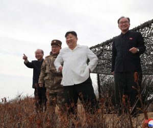 epa10539852 A photo released by the official North Korean Central News Agency (KCNA) shows North Korean Supreme Leader Kim Jong-un (2-R) observing a cruise missile exercise conducted in Jakdo-dong, South Hamgyong Province, North Korea, 22 March 2023 (issued 24 March 2023). According to North Korean state media, the test involved two Hwasai-1 and two Hwasai-2 strategic cruise missiles, equipped with a 'test warhead simulating a nuclear warhead.'  EPA/KCNA   EDITORIAL USE ONLY