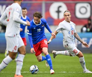 epa10544410 Liechtenstein's Nicolas Hasler (L) and Iceland's Arnor Sigurdsson in action during the UEFA Euro 2024 qualifying group J soccer match between Liechtenstein and Iceland, in Vaduz, Liechtenstein, 26 March 2023.  EPA/GIAN EHRENZELLER