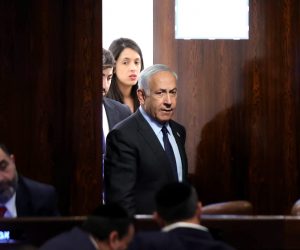epa10545538 Israeli Prime Minister Benjamin Netanyahu (C) attends a voting session in the Knesset, the Israeli parliament, in Jerusalem, Israel, 27 March 2023. Mass protests have been held in Israel for 12 weeks against the government's plans to reform the justice system and limit the power of the Israeli Supreme Court.  EPA/ABIR SULTAN
