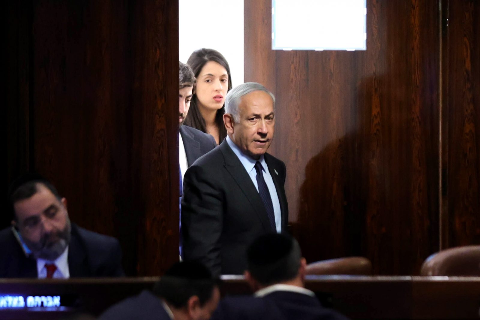 epa10545538 Israeli Prime Minister Benjamin Netanyahu (C) attends a voting session in the Knesset, the Israeli parliament, in Jerusalem, Israel, 27 March 2023. Mass protests have been held in Israel for 12 weeks against the government's plans to reform the justice system and limit the power of the Israeli Supreme Court.  EPA/ABIR SULTAN