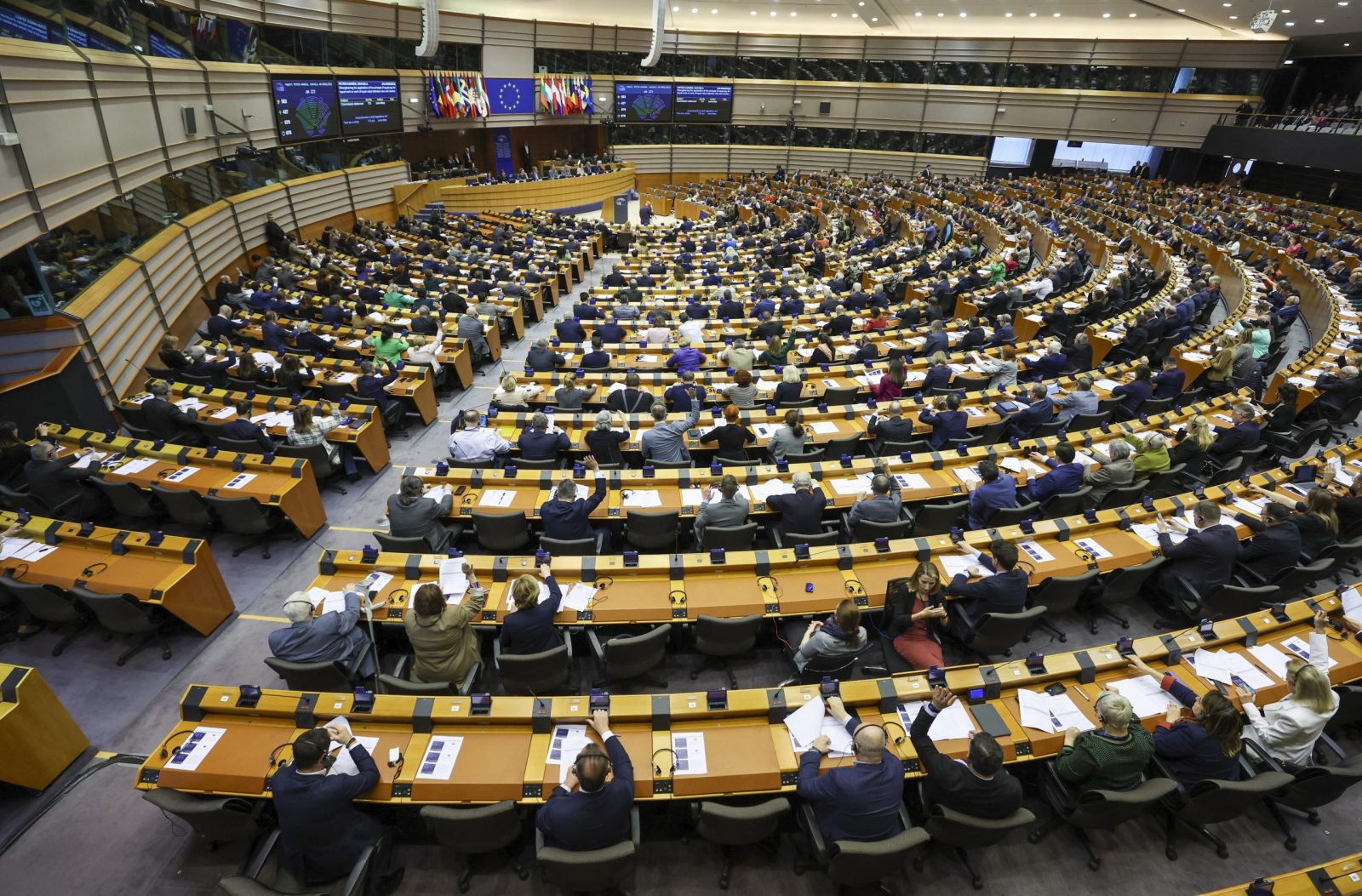 epa10550117 MPs vote in the hemicycle during a plenary session of the European Parliament in Brussels, Belgium, 30 March 2023. The session focused on the Rule of Law in Greece, Spain and Malta.  EPA/OLIVIER HOSLET
