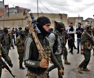 epaselect epa09714559 Fighters of the Syria Democratic Forces take part in mop-up operations in Hasaka, northeastern Syria, 28 January 2022. The US-backed Syria Democratic Forces (SDF) announced that they had retaken full control of Ghwayran prison in the city of Hasaka and re-arrested dozens of jihadists holed up in the prison and in nearby houses, after a major jailbreak attempt from the so-called Islamic State group (IS or ISIS) militants.  EPA-EFE/AHMED MARDNLI