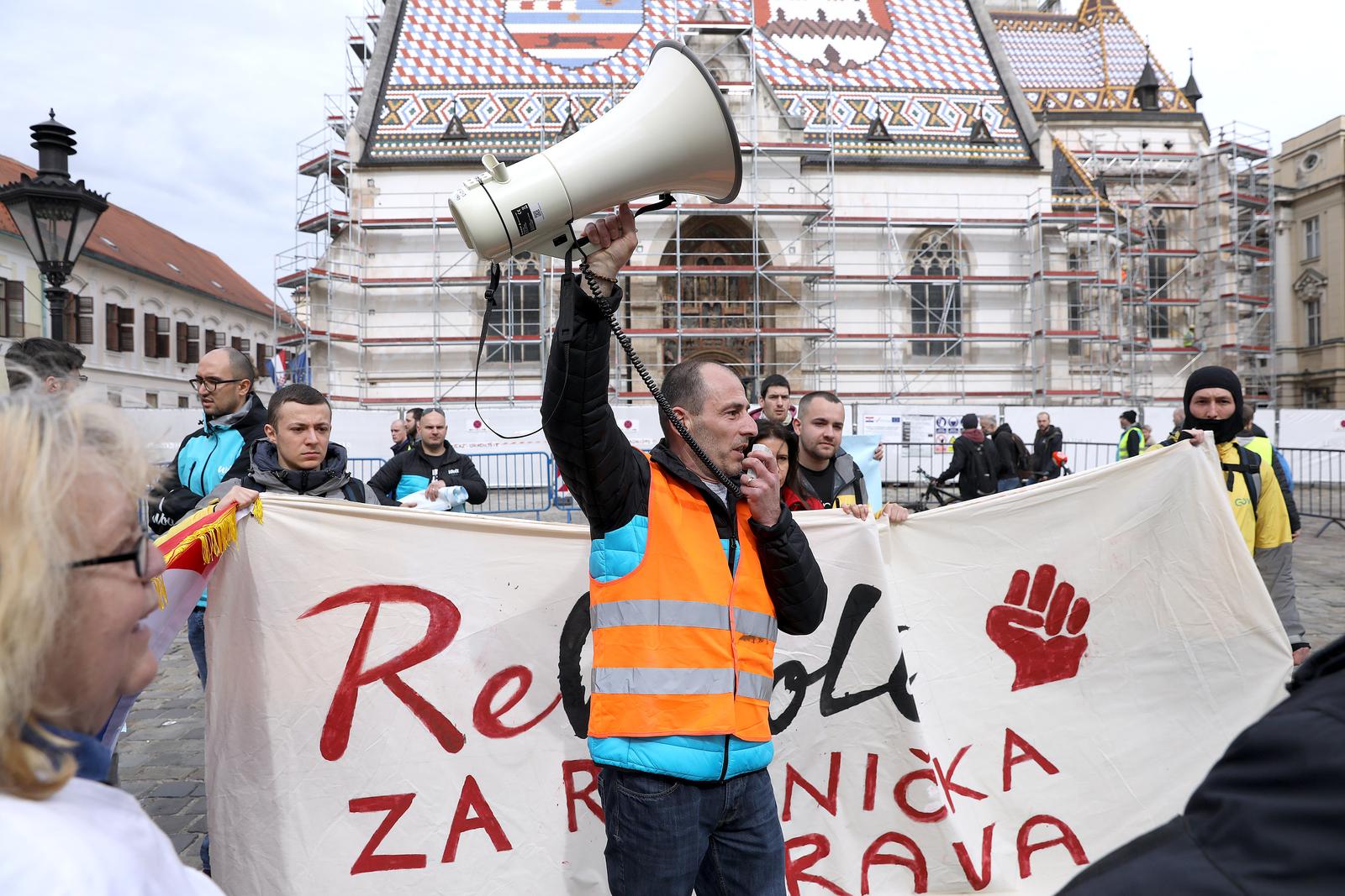 10.03.2023., Zagreb - Prosvjed inicijative zajednice Wolt dostavljaca uz potporu novog sindikata i dostavljaca Glovo i Bolt odrzava se na Trgu svetog Marka. Photo: Patrik Macek/PIXSELL