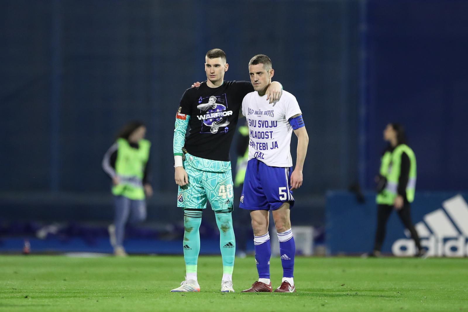 19.03.2023., stadion Maksimir, Zagreb - SuperSport HNL, 26. kolo, GNK Dinamo - HNK Rijeka. Dominik Livakovic, Arijan Ademi Photo: Matija Habljak/PIXSELL