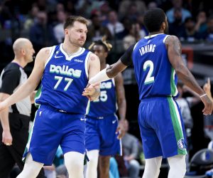 Mar 24, 2023; Dallas, Texas, USA; Dallas Mavericks guard Luka Doncic (77) celebrates with Dallas Mavericks guard Kyrie Irving (2) during the third quarter against the Charlotte Hornets at American Airlines Center. Mandatory Credit: Kevin Jairaj-USA TODAY Sports Photo: Kevin Jairaj/REUTERS