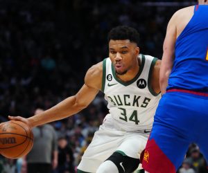 Mar 25, 2023; Denver, Colorado, USA; Milwaukee Bucks forward Giannis Antetokounmpo (34) drives at Denver Nuggets center Nikola Jokic (15) in the second quarter at Ball Arena. Mandatory Credit: Ron Chenoy-USA TODAY Sports Photo: Ron Chenoy/REUTERS