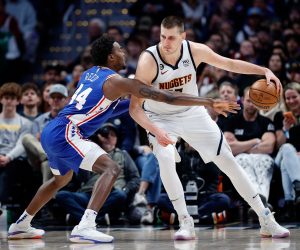 Mar 27, 2023; Denver, Colorado, USA; Denver Nuggets center Nikola Jokic (15) controls the ball as Philadelphia 76ers forward Paul Reed (44) guards in the third quarter at Ball Arena. Mandatory Credit: Isaiah J. Downing-USA TODAY Sports Photo: Isaiah J. Downing/REUTERS