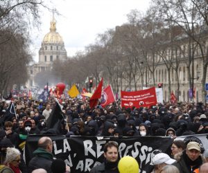 epa10524360 Thousands of people participate in a new demonstration against the government's reform of the pension system in Paris, France, 15 March 2023. Protests continue across the country due to the French government's plan to raise retirement age from 62 to 64 by 2030. On 09 March, a majority of senators validated the increasing of the legal retirement age to 64 years, the final adoption of the reform could take place on 16 March at the parliament.  EPA/YOAN VALAT