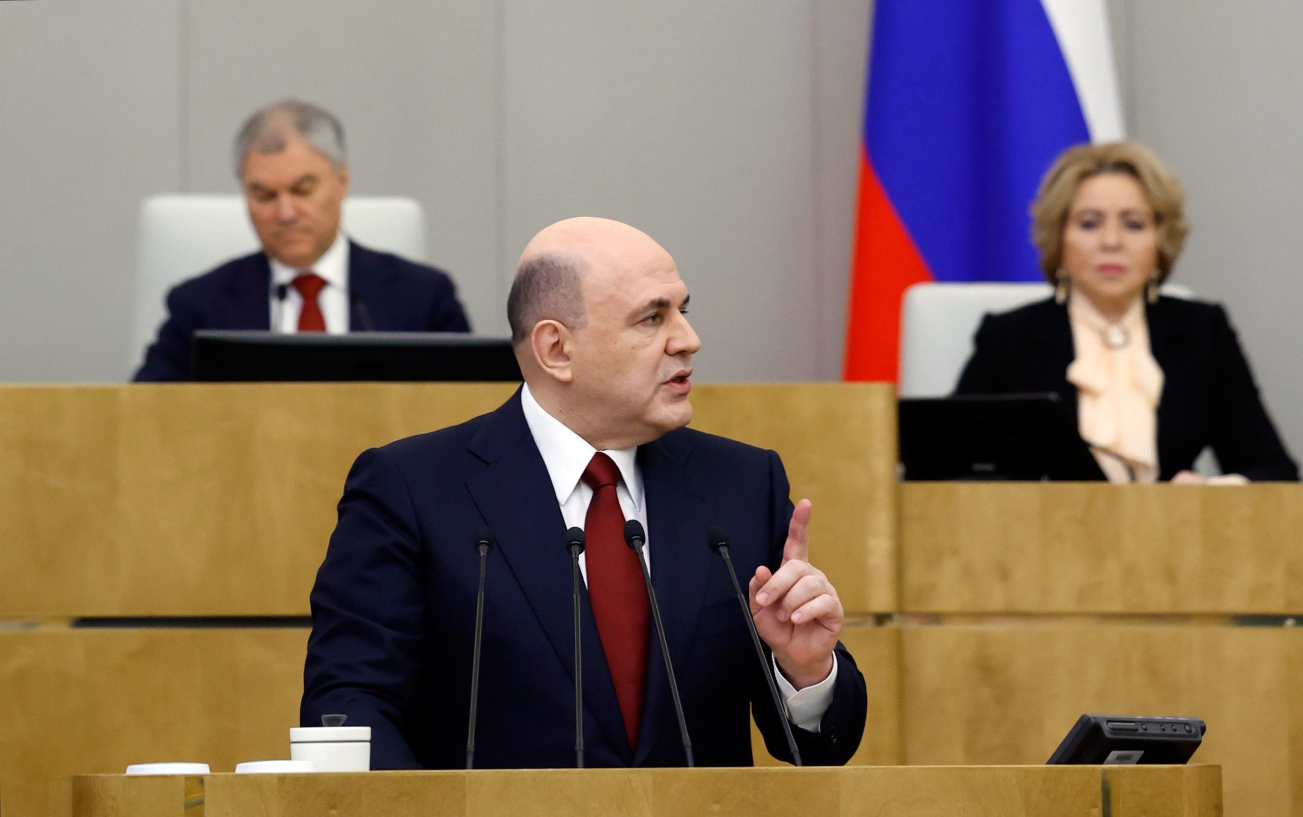 epa10538235 Russian Prime Minister Mikhail Mishustin presents the government's annual report at a session of the State Duma, the country's lower house of parliament, in Moscow, Russia, 23 March 2023. The Russian Federation created "all the necessary conditions for the work of those companies that see their future in Russia, including for foreign businesses from unfriendly states. Despite all the restrictions, the denial of property rights, and the discriminatory measures that Russian business faced in the West, we, foreign companies, have worked and are working comfortably", Mishustin said.  EPA/DMITRY ASTAKHOV/SPUTNIK/GOVERNMENT PRESS SERVICE POOL MANDATORY CREDIT