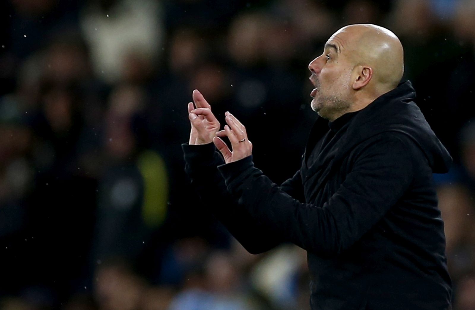 epa10522927 Manchester City's manager Pep Guardiola reacts during the UEFA Champions League Round of 16, 2nd leg match between Manchester City and RB Leipzig in Manchester, Britain, 14 March 2023.  EPA/Adam Vaughan