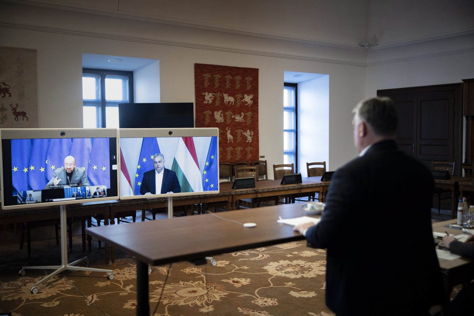 epa10535634 A handout photo made available by the Hungarian Prime Minister's Press Office shows Hungarian Prime Minister Viktor Orban (R) attending a video conference along with his Greek, Slovenian, Slovak and Latvian counterparts, as well as European Council President Charles Michel (L) from his office in Budapest, Hungary, 21 March 2023. The leaders held their talk in preparation for the upcoming European Council summit on 23 and 24 March in Brussels.  EPA/Zoltan Fischer/ Hungarian PM's Press Office HANDOUT HUNGARY OUT HANDOUT EDITORIAL USE ONLY/NO SALES