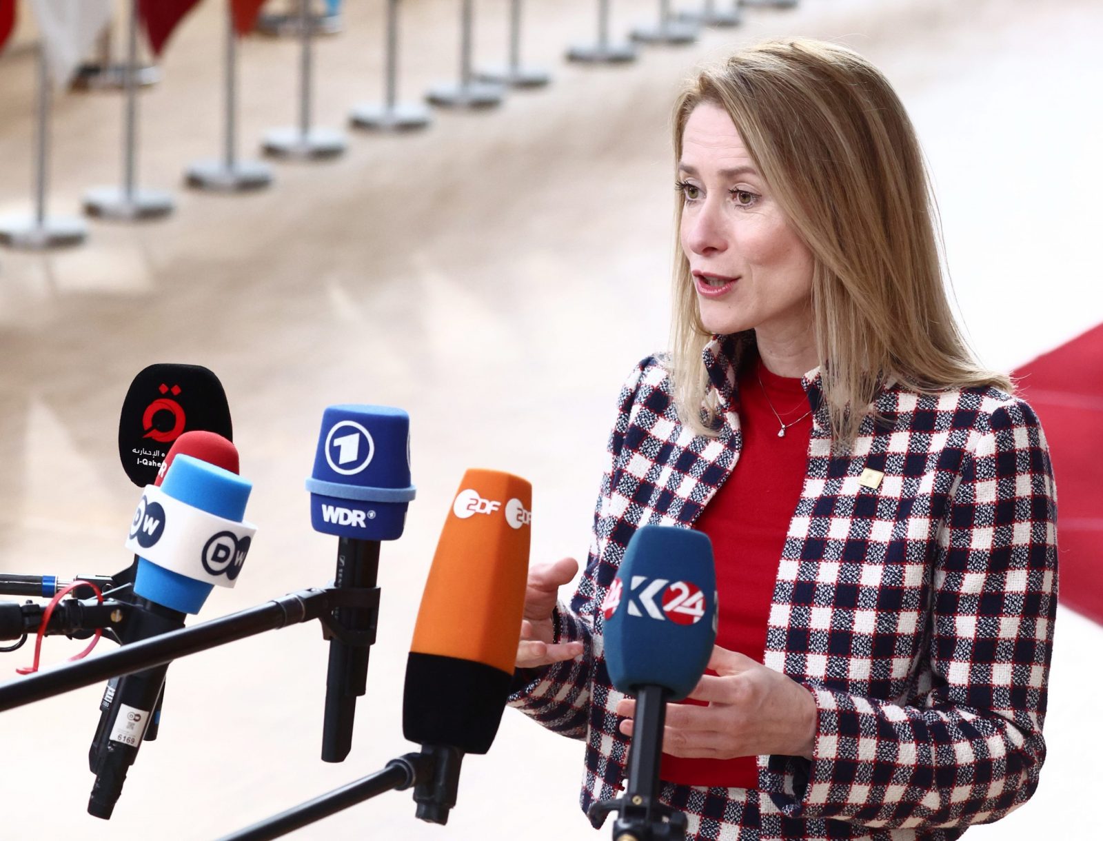 epa10538134 Estonia's Prime Minister Kaja Kallas speaks to the media as she arrives for a EU Summit in Brussels, Belgium, 23 March 2023. EU leaders will meet for a two-day summit in Brussels to discuss the latest developments in relation to 'Russia's war of aggression against Ukraine' and continued EU support for Ukraine and its people. The leaders will also debate on competitiveness, single market and the economy, energy, external relations among other topics, including migration.  EPA/STEPHANIE LECOCQ