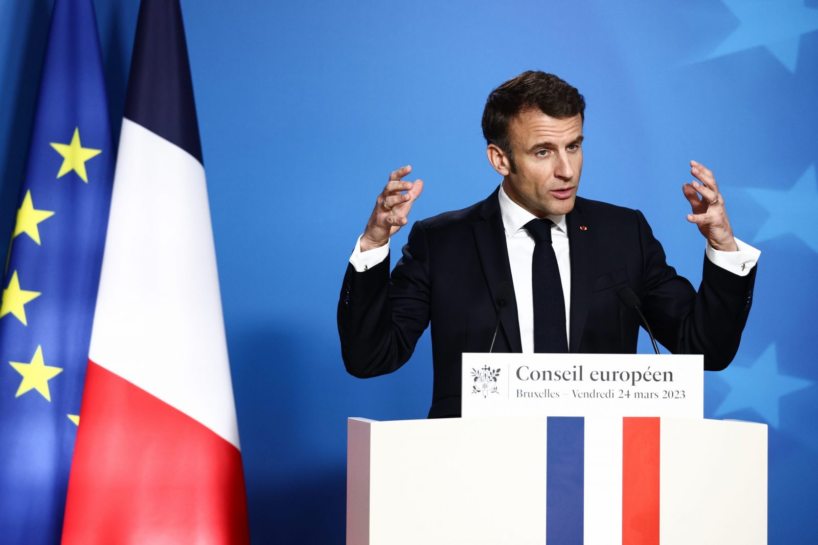epa10540678 French President Emmanuel Macron gives a press conference at the end of the second day of an  EU Summit in Brussels, Belgium, 24 March 2023.  EPA/STEPHANIE LECOCQ