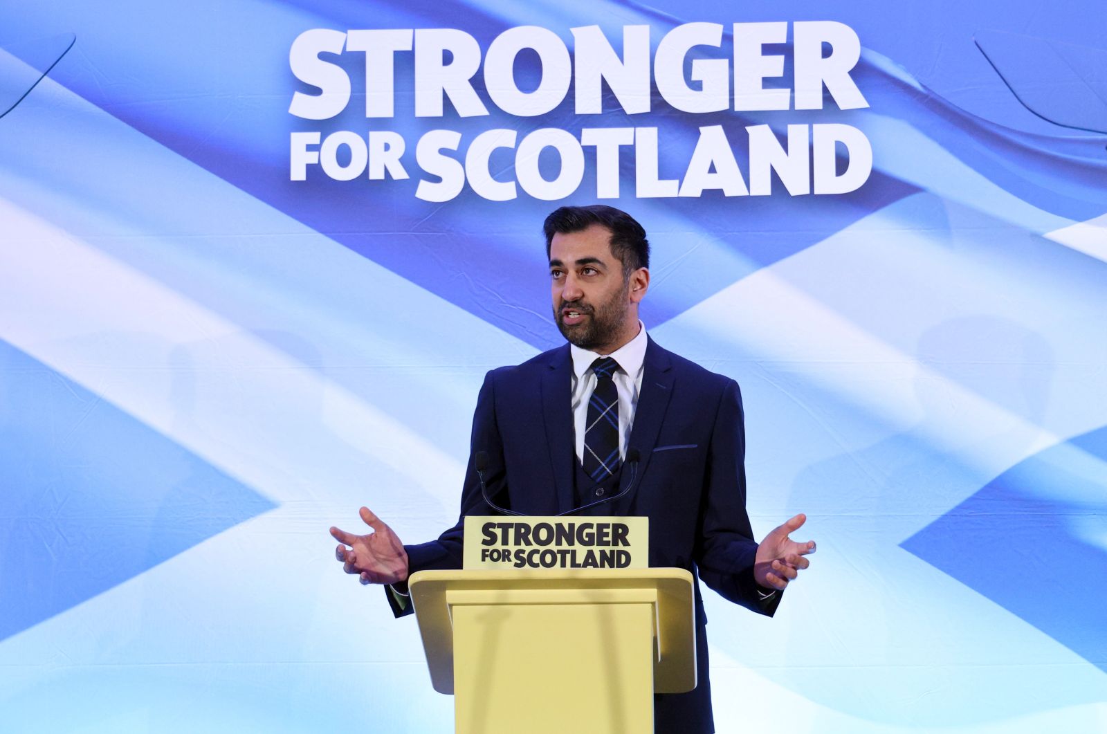 epa10545509 The new leader of the Scottish National Party and former Health Secretary Humza Yousaf speaks after he is announced at Murrayfield Stadium in Edinburgh, Scotland, Britain 27 March 2023. The result follows a five-week contest after the former leader and First Minister Nicola Sturgeon stood down. There will be a vote in Holyrood parliament on 28 March to select the next first minister.  EPA/ROBERT PERRY