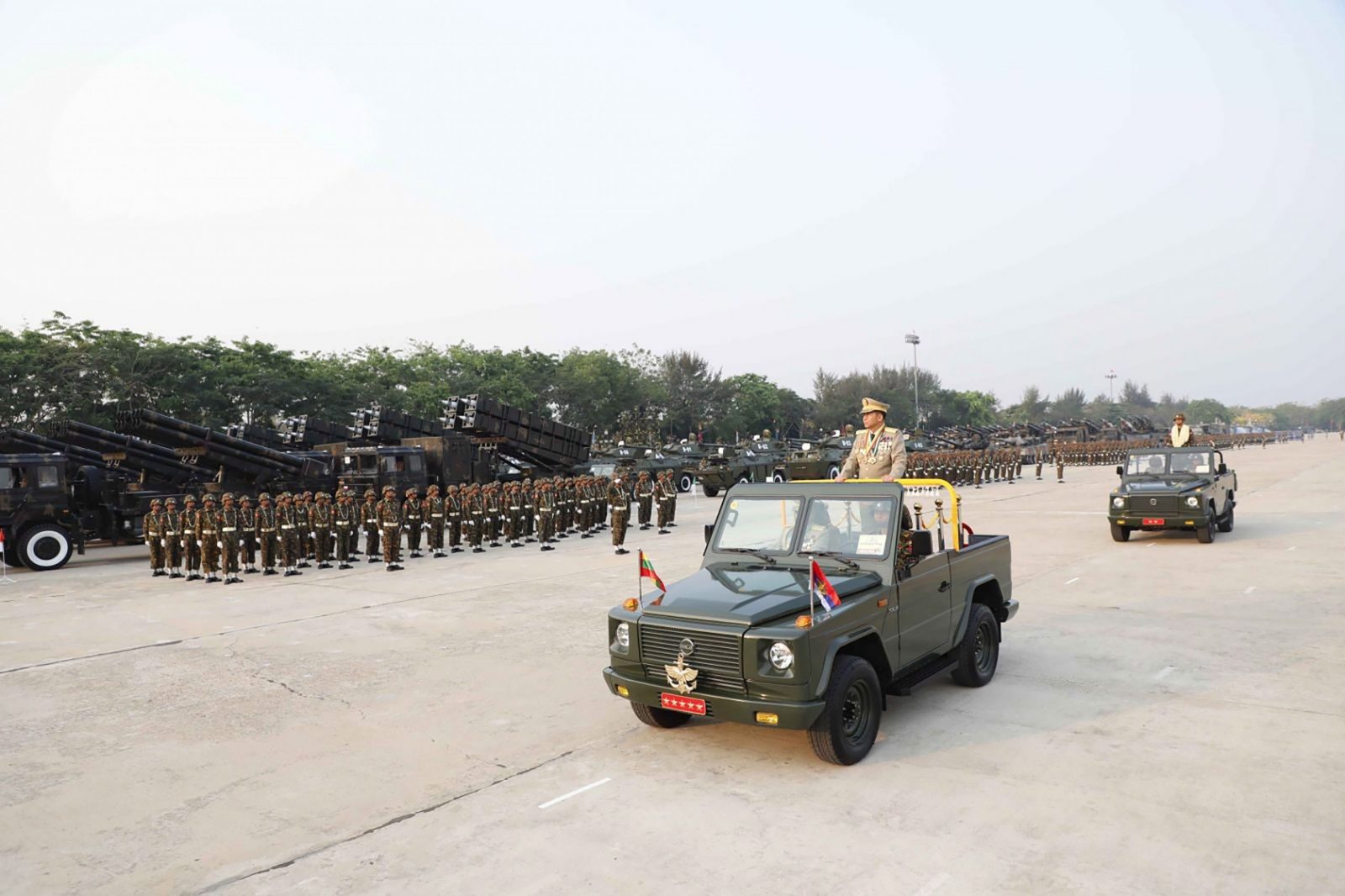 epa10545632 A handout photo made available by Myanmar Military Information Team shows Myanmar military Commander-in-Chief Senior General Min Aung Hlaing (C) inspecting the troops during the 78th Armed Forces Day in Naypyidaw, Myanmar, 27 March 2023.  EPA/MYANMAR MILITARY INFO TEAM / HANDOUT  HANDOUT EDITORIAL USE ONLY/NO SALES