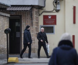 epa10552069 Men leave the detention center Lefortovo where Wall Street Journal (WSJ) journalist Evan Gershkovich is being held, in Moscow, Russia, 31 March 2023. WSJ reporter Evan Gershkovich was arrested on espionage charges in the Ural Mountains city of Yekaterinburg, Russia, on 30 March 2023.  EPA/YURI KOCHETKOV