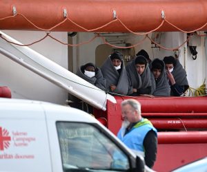 epa10557907 Migrants disembark from the ship Ocean Viking moored at the port of Salerno, Italy, 04 April 2023. The search-and-rescue ship reached Salerno port earlier the day with 92 migrants, 51 of them minors, on board who were rescued off the Libyan coast.  EPA/Massimo Pica