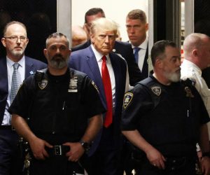 epa10558601 Former US President Donald J. Trump walks towards the courtroom inside New York Criminal Court in New York, New York, USA, 04 April 2023. A Manhattan grand jury voted to indict former President Donald J. Trump last week and he will turn himself in at the courthouse and appear before a judge to hear the charges against him later today.  EPA/JUSTIN LANE