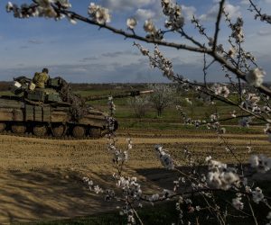 epa10567790 A tank moves on the road,  at undisclosed location near Bakhmut,  Donetsk region, Ukraine, 10 April 2023. Russian troops entered Ukrainian territory on 24 February 2022, starting a conflict that has provoked destruction and a humanitarian crisis.  EPA/OLEG PETRASYUK