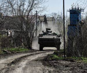 epa10567784 A Ukrainian forces' M113 APC drives at an undisclosed location near Bakhmut, Donetsk region, Ukraine, 10 April 2023. Russian troops entered Ukrainian territory on 24 February 2022, starting a conflict that has provoked destruction and a humanitarian crisis.  EPA/OLEG PETRASYUK