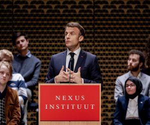 epa10568516 French President Emmanuel Macron delivers a speech in The Hague, Netherlands, 11 April 2023. The French president and his wife are paying a two-day state visit to the Netherlands.  EPA/REMKO DE WAAL