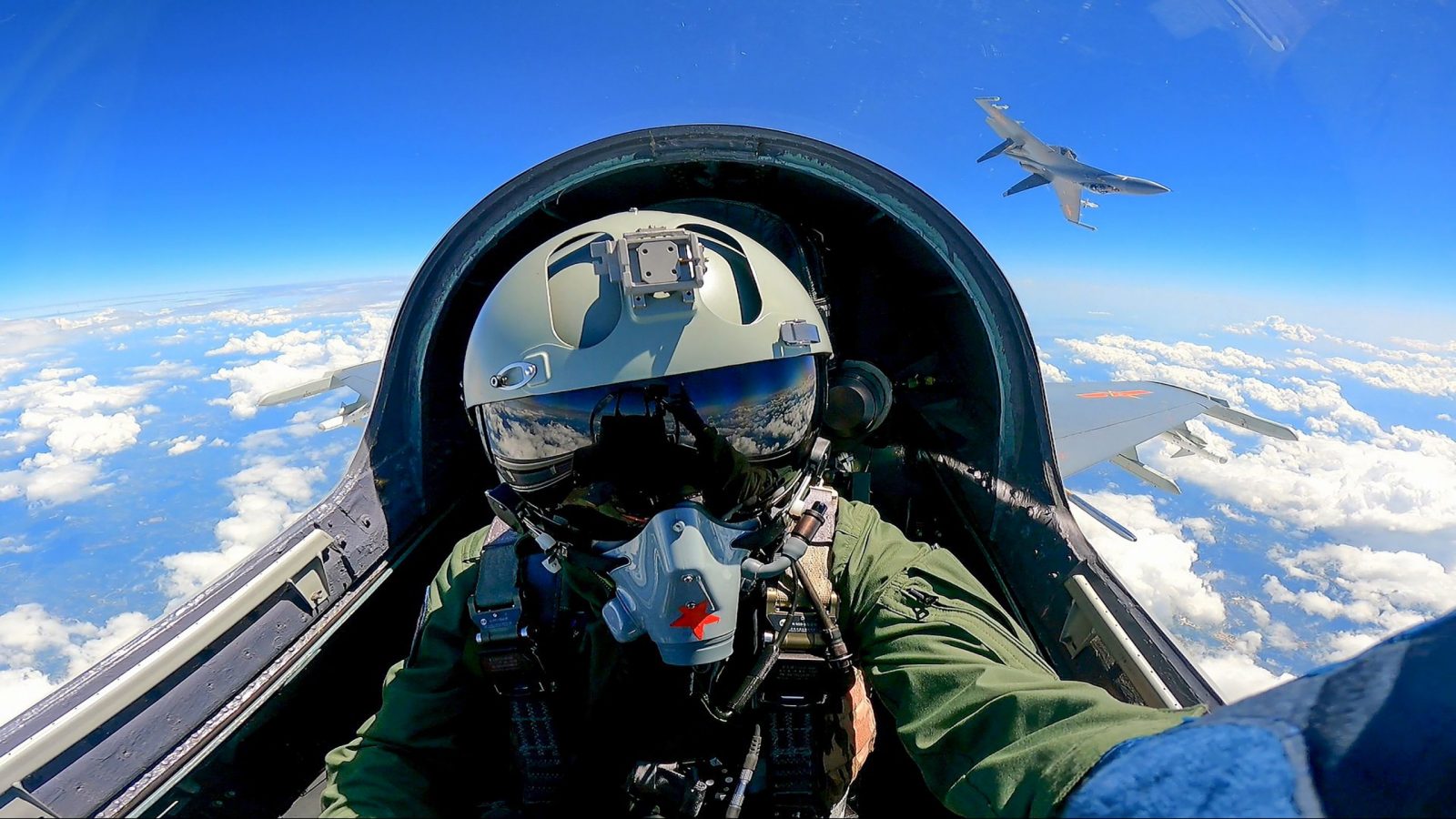 epa10568001 A Chinese fighter jet pilot from of the Eastern Theater Command of the Chinese People's Liberation Army (PLA) takes part in combat readiness patrol and military exercises around the Taiwan Island, 10 April 2023 (issued 11 April 2023). The Eastern Theater Command of the PLA conducted three days of military drills around the Taiwan Strait from 08 to 10 April. China launched the military exercises in response to the meeting in the United States between Taiwan's President Tsai Ing-wen and US House Speaker Kevin McCarthy on 05 April.  EPA/XINHUA / Mei Shaoquan CHINA OUT / MANDATORY CREDIT  EDITORIAL USE ONLY