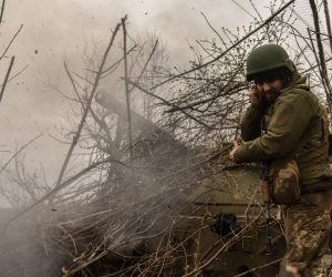 epa10569840 A Ukrainian artilleryman of the 57th Otaman Kost Hordiienko Separate Motorized Infantry Brigade as a 2s3 Akatsia howitzer fires at an undisclosed position near outskirts of Bakhmut, Donetsk region, Ukraine, 12 April 2023. Russian troops entered Ukrainian territory on 24 February 2022, starting a conflict that has provoked destruction and a humanitarian crisis.  EPA/OLEG PETRASYUK