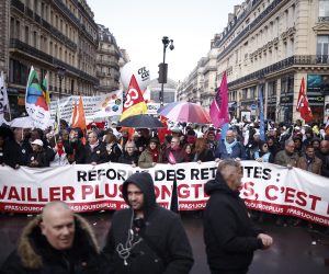 epa10570774 Leaders of main French unions hold a banner reading 'Pension reform: working longer means no' during a rally against the French government’s pension reform, in Paris, France, 13 April 2023. The 'sages', members of the Constitutional Council, were due to deliver their verdict on 14 April concerning the examination of the text of the pension reform, almost one month after the country's prime minister announced the use of article 49.3 of the French Constitution to have the text of the controversial bill to be definitively adopted without a vote. The reform would raise the retirement age from 62 to 64.  EPA/YOAN VALAT