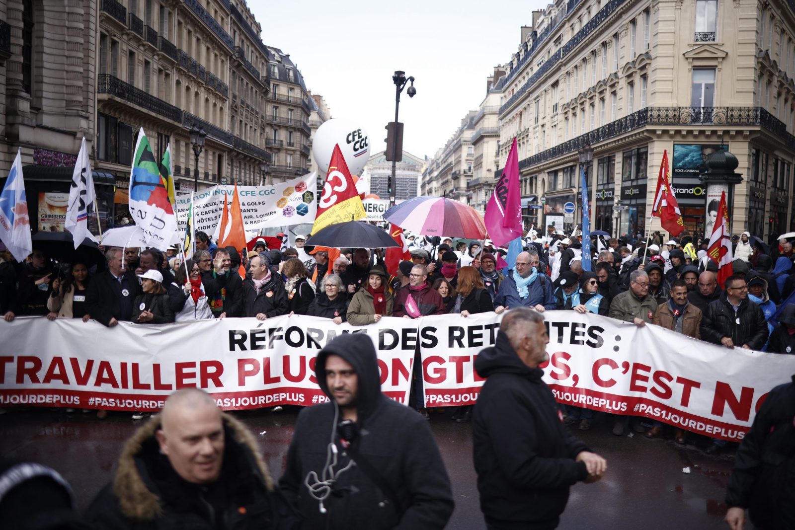 epa10570774 Leaders of main French unions hold a banner reading 'Pension reform: working longer means no' during a rally against the French government’s pension reform, in Paris, France, 13 April 2023. The 'sages', members of the Constitutional Council, were due to deliver their verdict on 14 April concerning the examination of the text of the pension reform, almost one month after the country's prime minister announced the use of article 49.3 of the French Constitution to have the text of the controversial bill to be definitively adopted without a vote. The reform would raise the retirement age from 62 to 64.  EPA/YOAN VALAT