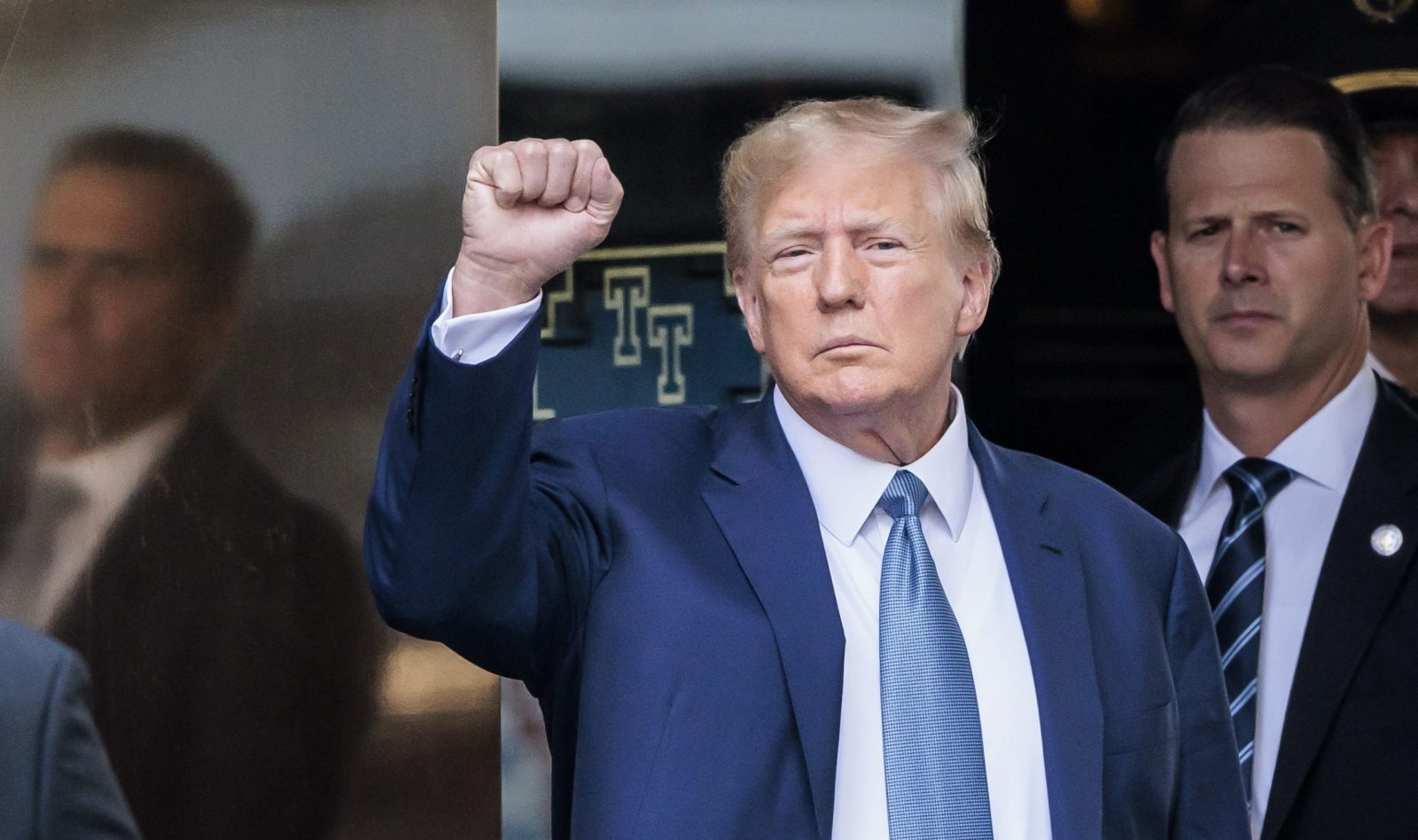 epa10570912 Former US president Donald J. Trump (C) departs Trump Tower on route to New York Attorney General Letitia James’ office for a deposition related to a civil lawsuit in New York, New York, USA, 13 April 2023. The lawsuit is alleging that Trump, his children, and the Trump Organization have provided false financial statements for years to lenders and business partners and reportedly is looking to ban the Trump Organization from operating in the state. In a separate case, a Trump was personally indicted last week by a Manhattan grand jury on 34 felony charges.  EPA/JUSTIN LANE / POOL