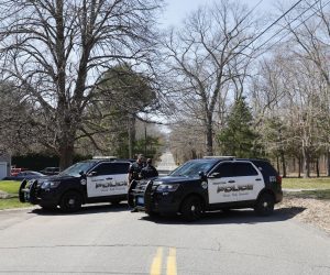 epa10571320 Members of the Dighton Police Department block a road on which the alleged suspect in a US intelligence leak lives in Dighton, Massachusetts, USA, 13 April 2023. US President Biden earlier in the day stated that investigators in the intelligence community and the Justice Department were closing in as part of an investigation in to the documents which were leaked online starting in March 2023.  EPA/CJ GUNTHER