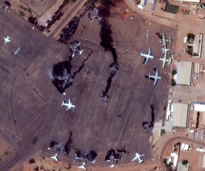 epa10577398 A handout satellite image made available by Maxar Technologies shows smoke billowing from destroyed aircrafts at Khartoum International Airport, in Khartoum, Sudan, 17 April 2023. Heavy gunfire and explosions were reported in Sudan's capital Khartoum since 15 April between the army and a paramilitary group following days of tension centering around the country's proposed transition to civilian rule.  EPA/MAXAR TECHNOLOGIES HANDOUT -- MANDATORY CREDIT: SATELLITE IMAGE 2023 MAXAR TECHNOLOGIES -- THE WATERMARK MAY NOT BE REMOVED/CROPPED -- HANDOUT EDITORIAL USE ONLY/NO SALES