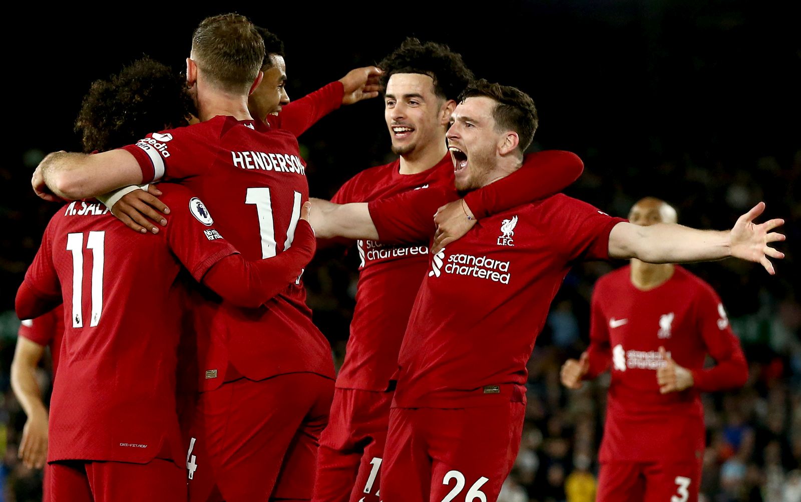 epa10577598 Mohamed Salah (L) of Liverpool celebrates with teammates after scoring his second goal during the English Premier League soccer match between Leeds United and Liverpool in Leeds, Britain, 17 April 2023.  EPA/ADAM VAUGHAN EDITORIAL USE ONLY. No use with unauthorized audio, video, data, fixture lists, club/league logos or 'live' services. Online in-match use limited to 120 images, no video emulation. No use in betting, games or single club/league/player publications