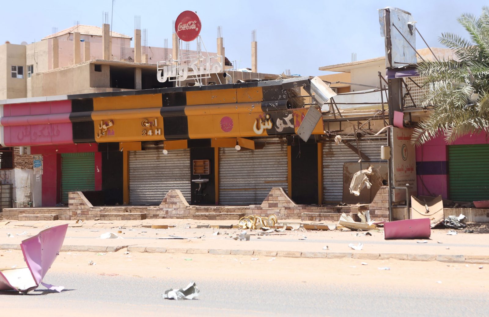 epa10579956 Damaged shops during the ongoing fighting between the Sudanese army and paramilitaries of the Rapid Support Forces (RSF) in Khartoum, Sudan, 19 April 2023. A power struggle erupted since 15 April between the Sudanese army led by army Chief General Abdel Fattah al-Burhan and the paramilitaries of the Rapid Support Forces (RSF) led by General Mohamed Hamdan Dagalo, resulting in at least 200 deaths according to doctors' association in Sudan.  EPA/STRINGER