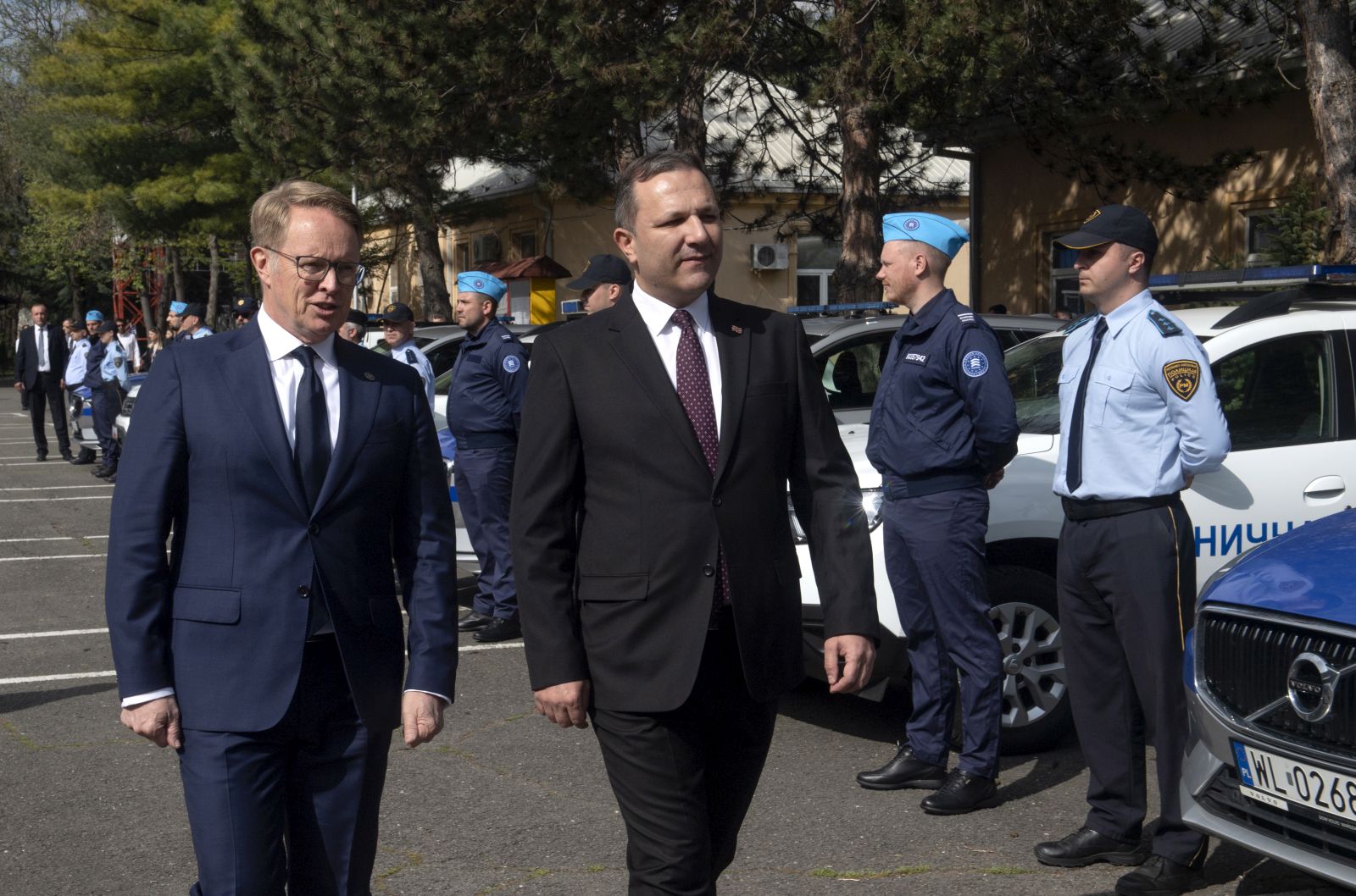 epa10581572 FRONTEX Executive Director Hans Leijtens (L) accompanied by North Macedonia's Interior Minister Oliver Spasovski (C) inspect the members of FRONTEX during the official launch ceremony of the FRONTEX Joint Operation in Skopje, Republic of North Macedonia, 20 April 2023. It is planned that in 2023, FRONTEX will deploy more than 100 officers, patrol vehicles and special equipment on the Macedonian-Greek border, which will significantly increase the capacity to detect illegal activities along the border, while respecting and protecting the basic rights of every person.  EPA/GEORGI LICOVSKI