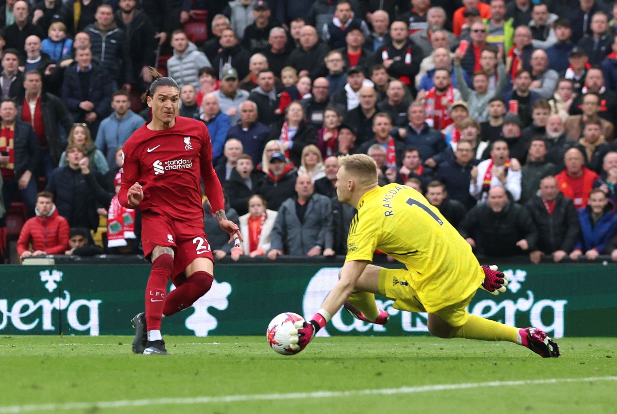 Soccer Football - Premier League - Liverpool v Arsenal - Anfield, Liverpool, Britain - April 9, 2023 Arsenal's Aaron Ramsdale saves a shot from Liverpool's Darwin Nunez REUTERS/Phil Noble EDITORIAL USE ONLY. No use with unauthorized audio, video, data, fixture lists, club/league logos or 'live' services. Online in-match use limited to 75 images, no video emulation. No use in betting, games or single club /league/player publications.  Please contact your account representative for further details. Photo: Phil Noble/REUTERS