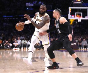 Apr 22, 2023; Los Angeles, California, USA; Los Angeles Lakers forward LeBron James (6) dribbles the ball against Memphis Grizzlies forward Dillon Brooks (24) in the second quarter during game three of the 2023 NBA playoffs at Crypto.com Arena. Mandatory Credit: Kirby Lee-USA TODAY Sports Photo: Kirby Lee/REUTERS